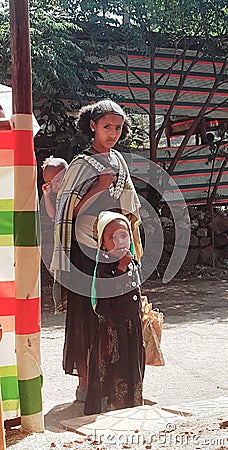 Beautiful women with her young childrens. Editorial Stock Photo