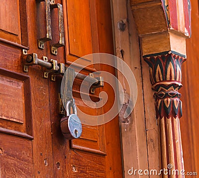 Beautiful wooden door is locked Editorial Stock Photo