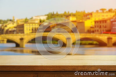 Beautiful wooden table on the background of italian florence during sunset. Copy space. Product demo template concept Stock Photo