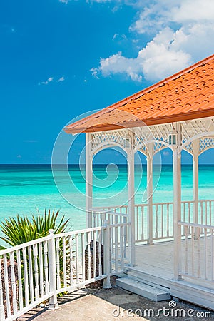 Beautiful wooden terrace next to a beach in Cuba Stock Photo