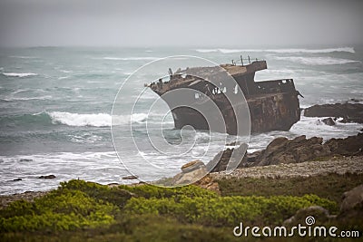 Beautiful wreck and shipwreck and stranded at Cape Agulhas in South Africa, this place divides two oceans Stock Photo