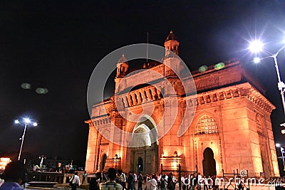 Beautiful yellow glowing Light on gateway of India Editorial Stock Photo