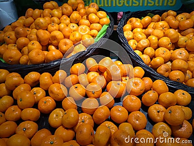 Beautiful yellow oranges. Fruits are high in vitamins, helping to maintain healthy eyesight Stock Photo