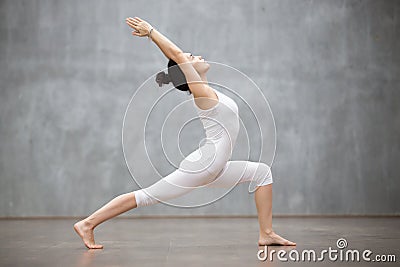 Beautiful Yoga: Warrior one pose Stock Photo