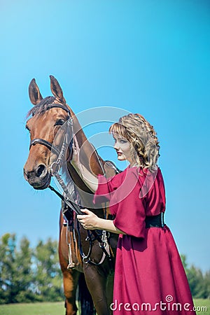 Beautiful yong womanl and horse Stock Photo