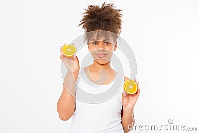 Beautiful young african american woman isolated with oranges on white background. Afro girl and diet concept. Copy space. Skin Stock Photo