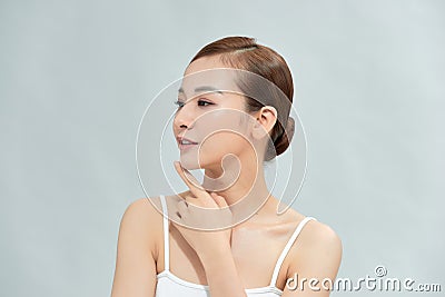 Beautiful young asian woman showing clear and fresh body skin ,natural makeup Stock Photo