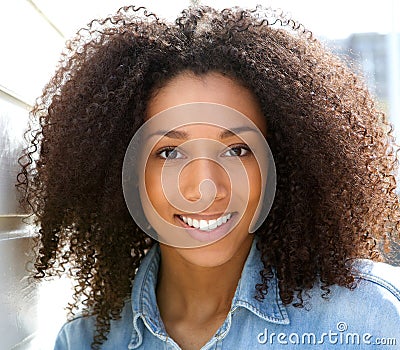 Beautiful young black woman smiling Stock Photo