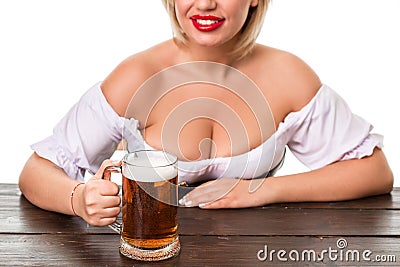 Beautiful young blond girl of oktoberfest beer stein Stock Photo