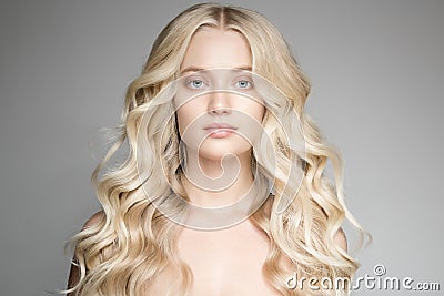 Beautiful Young Blond Woman With Long Wavy Hair. Stock Photo