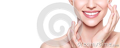 Beautiful Young Blond Woman with Perfect Skin touching her face. Facial treatment. Cosmetology, beauty and spa concept. Stock Photo