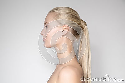 Beautiful Young Blond Woman With Ponytail Hairstyle Stock Photo