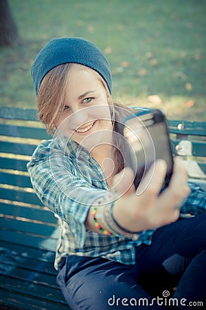 Beautiful young blonde hipster woman selfie Stock Photo