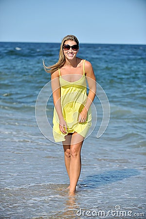 beautiful young blonde woman sundress beach 28560044