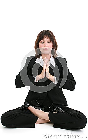 Beautiful Young Business Woman In Suit Meditating Stock Photo