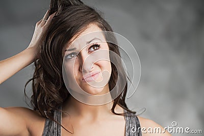 Beautiful Young Caucasian Woman Making A Decision Stock Photo