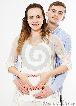 Beautiful young couple expecting baby, make hearth hand Stock Photo