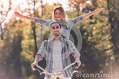 Couple with a tandem bicycle Stock Photo