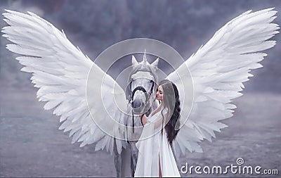 Beautiful, young elf, walking with a unicorn. She is wearing an incredible light, white dress. Art hotography Stock Photo