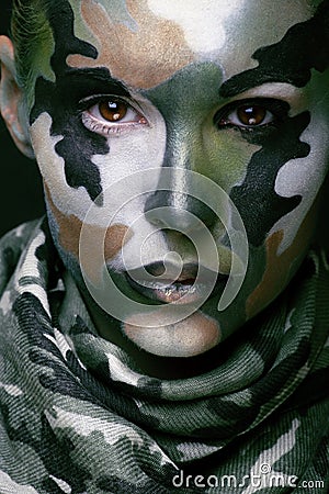 Beautiful young fashion woman with military style Stock Photo