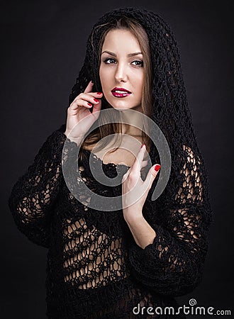 A beautiful young girl in a black shawl Stock Photo