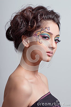 Beautiful young girl with fantasy makeup Stock Photo