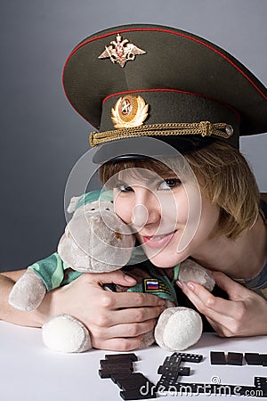 Beautiful young girl in form of Russian army Stock Photo