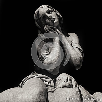 Young girl praying with her dog Stock Photo