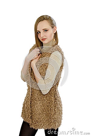 Beautiful young girl in a vest an artificial fur Stock Photo