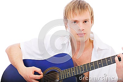 Beautiful young man plays guitar Stock Photo