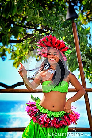Beautiful young Polynesian Hawaiian woman performing traditional Hula dance Editorial Stock Photo