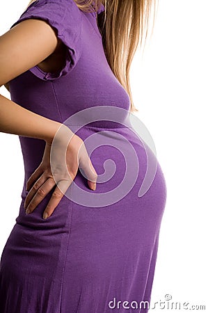 Beautiful young pregnant blond girl Stock Photo