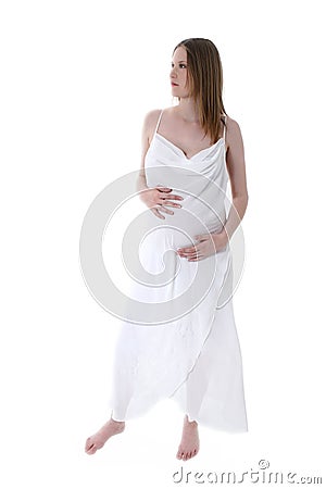 Beautiful Young Pregnant Woman In White Over White Stock Photo