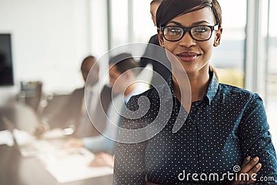 Beautiful young professional woman in office Stock Photo