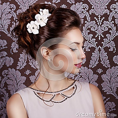 Beautiful young sweet girl with large red lips in wedding white wreath on the head Stock Photo