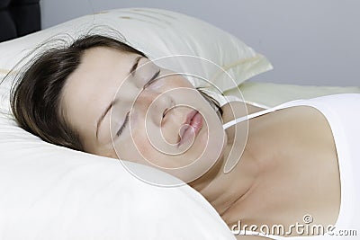 The beautiful young sleeping woman Stock Photo