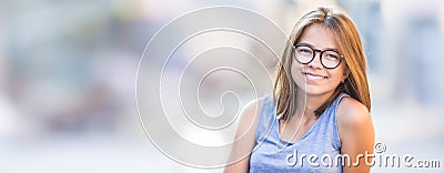 Beautiful young smiling teen girl with glasses. Stock Photo