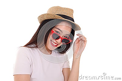 Beautiful young south east Asian woman wearing red frame sunglass eyewear hat pose fashion style white background look around copy Stock Photo