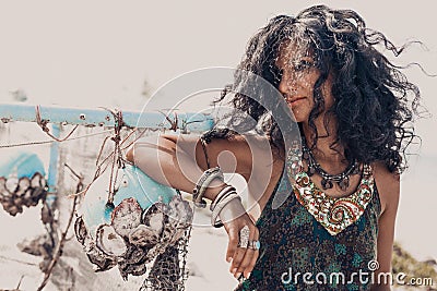 beautiful young stylish woman close up portrait with eastern accessories Stock Photo