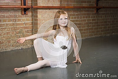 Beautiful young and talented dancer posing at a dance studio Stock Photo