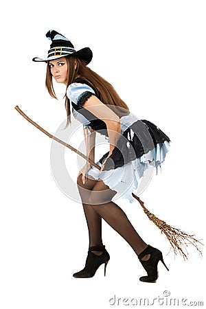 Beautiful young woman with a besom Stock Photo