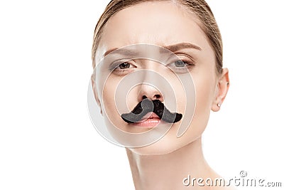 Beautiful young woman with black mustaches looking at camera Stock Photo