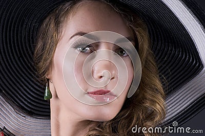 Beautiful young woman in black soiled Stock Photo