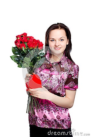 Beautiful young woman with a bouquet of red roses Stock Photo