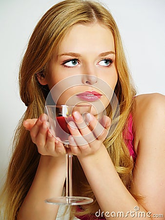 Beautiful young woman with candle in glass Stock Photo