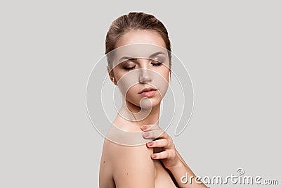 Beautiful Young Woman with Clean Fresh Skin Stock Photo