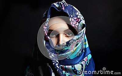 Beautiful young woman in color veil. beauty girl in colorful hijab Stock Photo