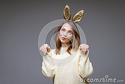 beautiful young woman with ears posing on background Stock Photo