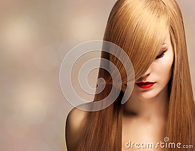 Beautiful young woman with elegant long shiny hair Stock Photo