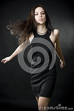 Beautiful young woman with flying hair Stock Photo